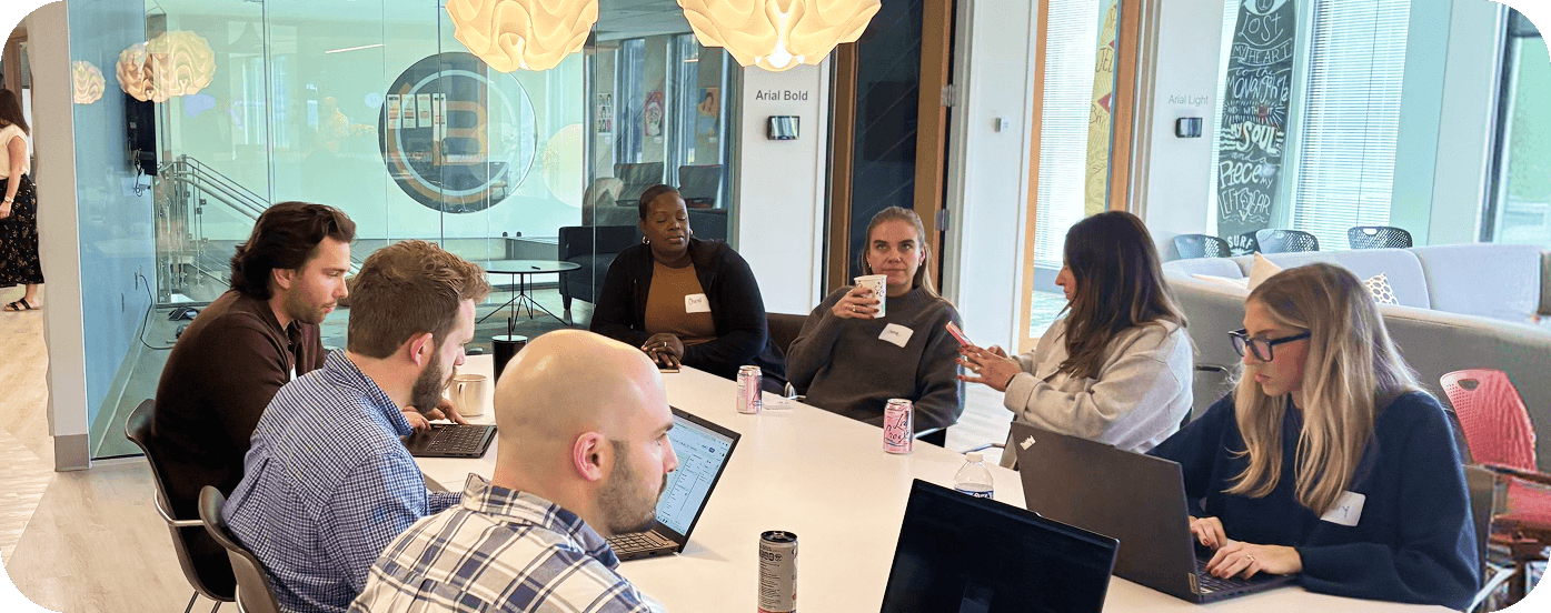 Brunner employees having a meeting in a conference room