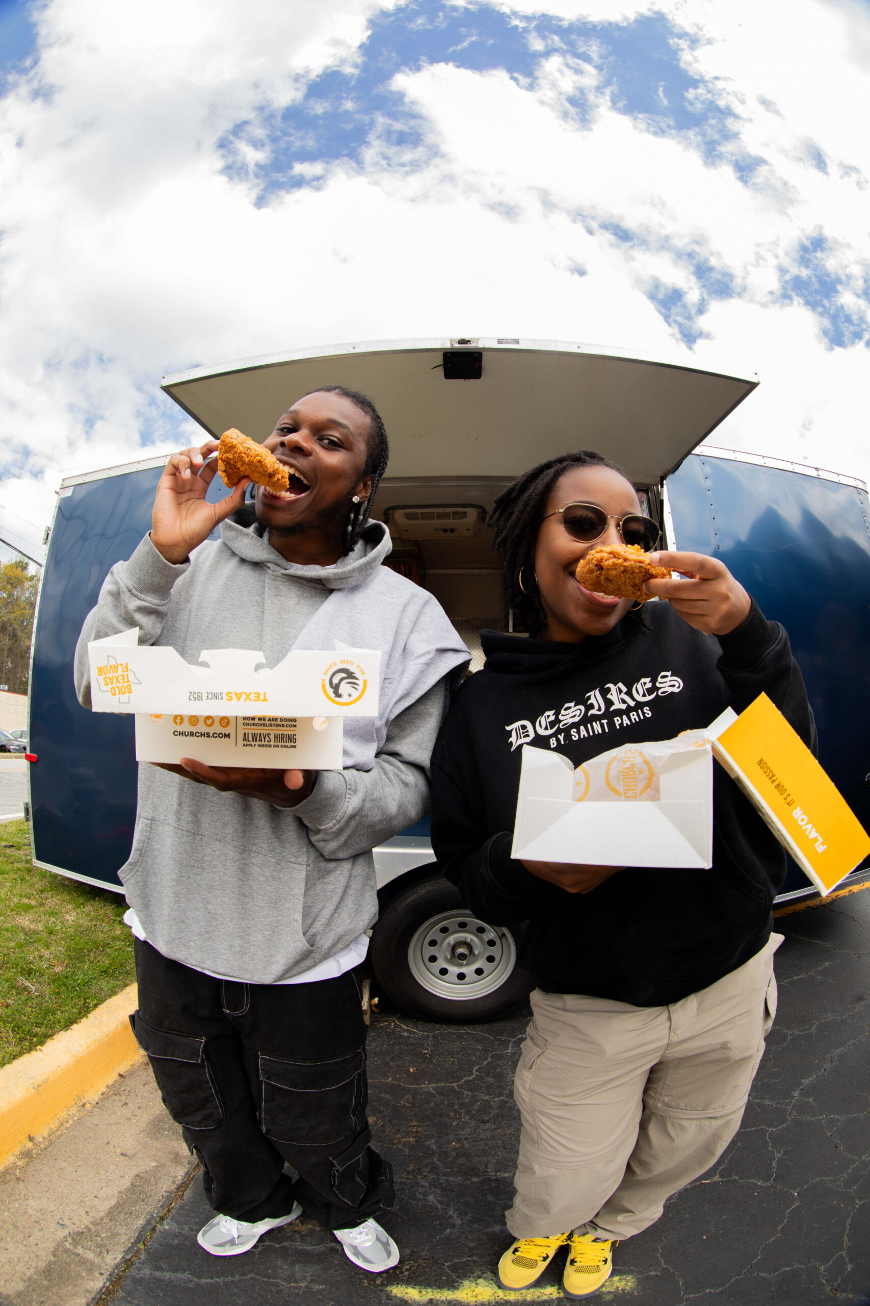 Man And Woman Eating Church's Chicken