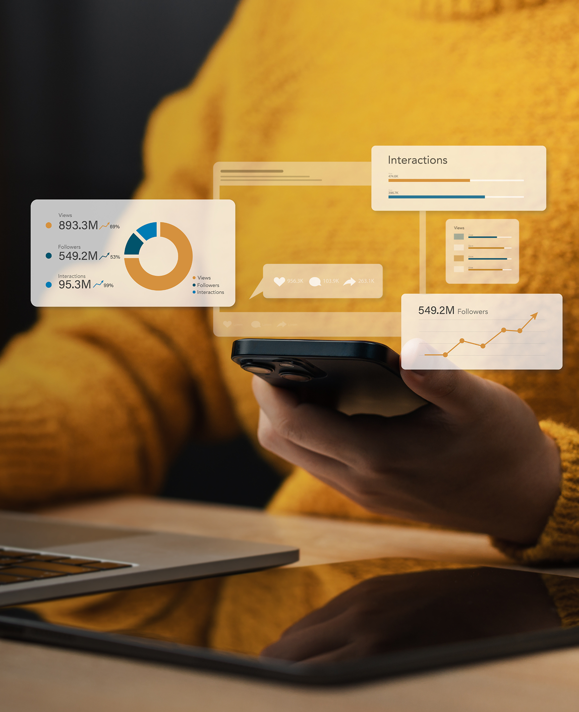 Person holding a phone with social analytics overlay graphics