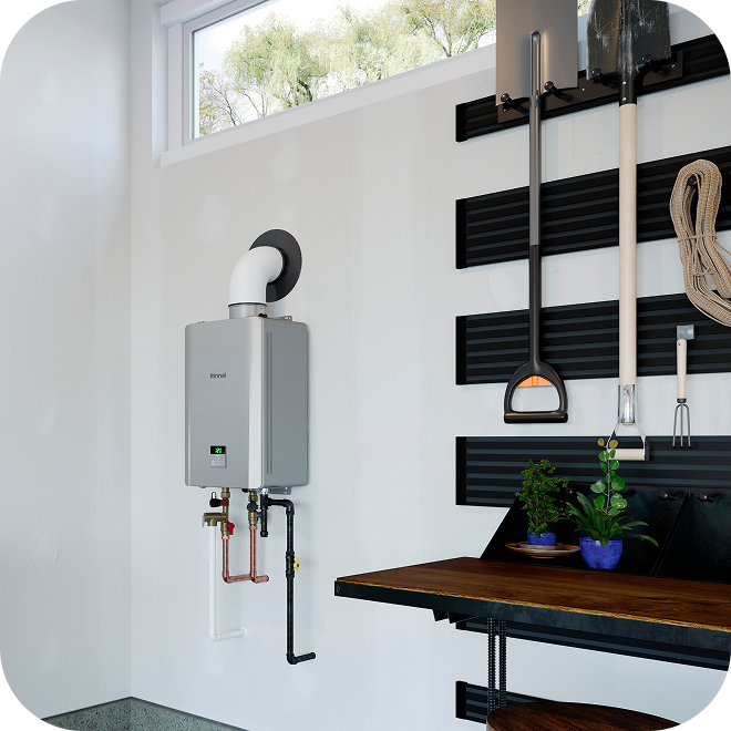 A Rinnai tankless water heater installed in a garage.