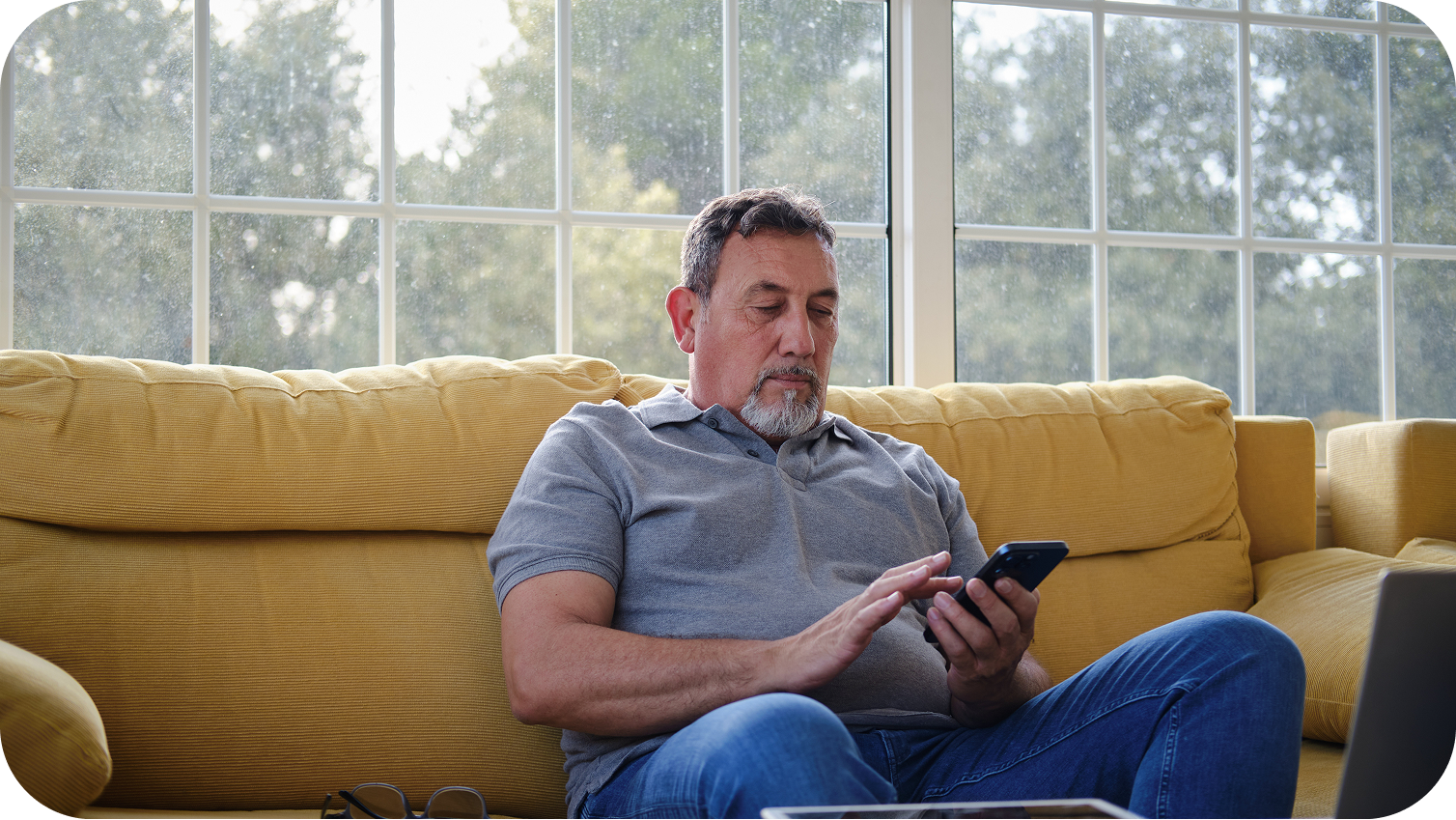 A person looking on a mobile phone