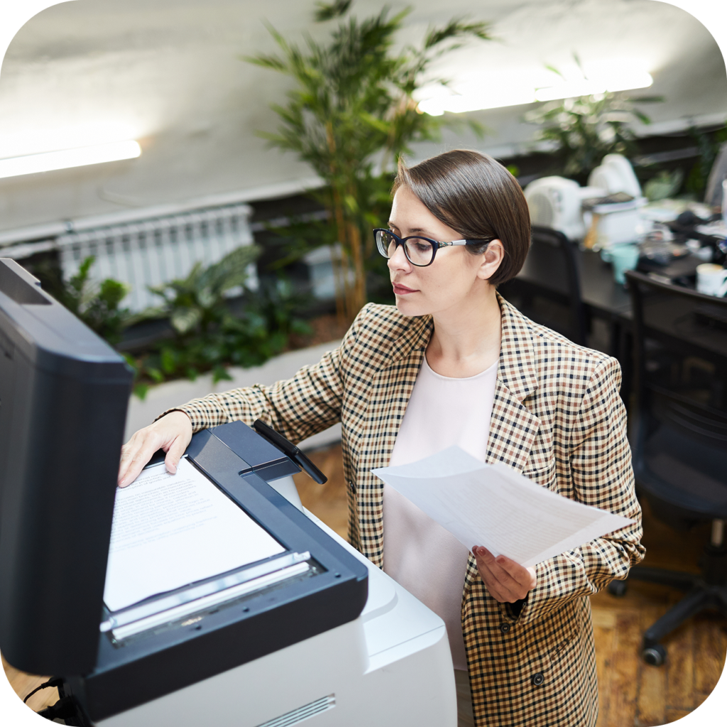 A person using a copier