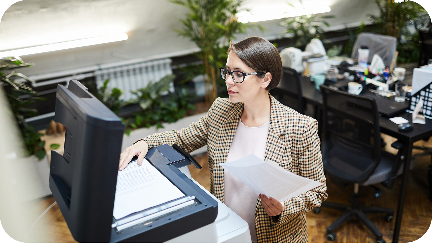 A person using a copier