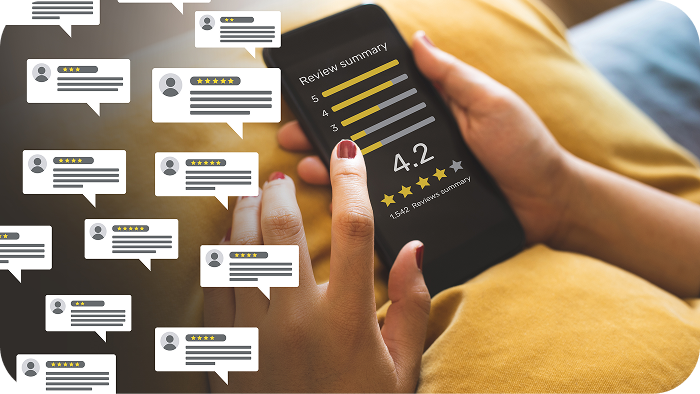 Person looking on mobile phone at a review summary